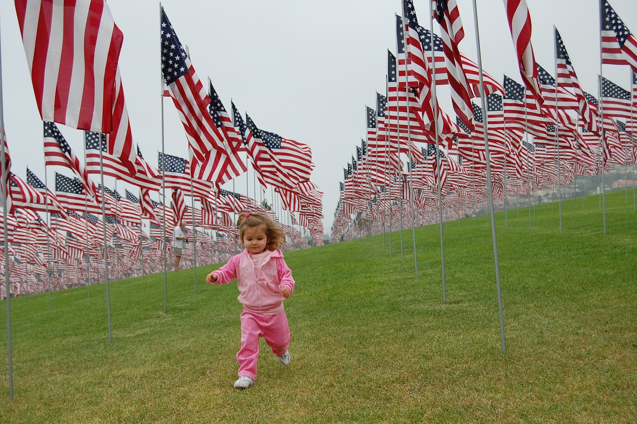 toddler and flags